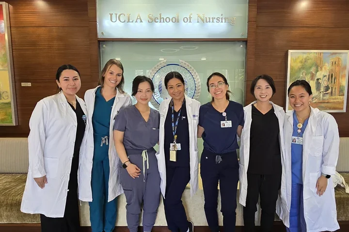 NP students and faculty gathered in the school of nursing.