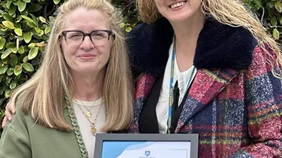 Nancy Pike (left) and Kristi Westphaln (right) posing for a photograph