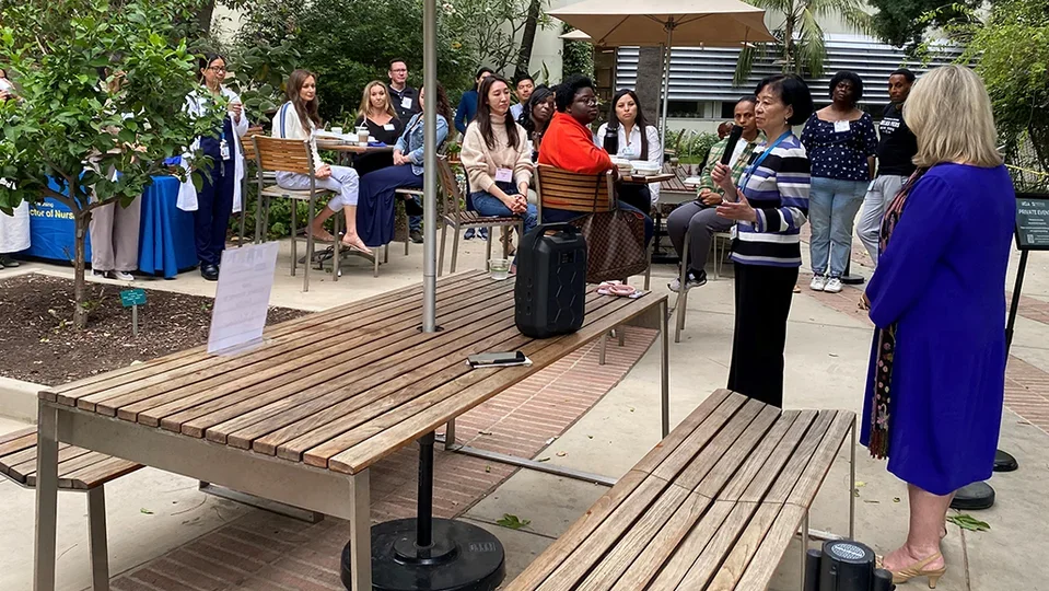 Dean Lin Zhan speaking at the DNP Welcome Breakfast