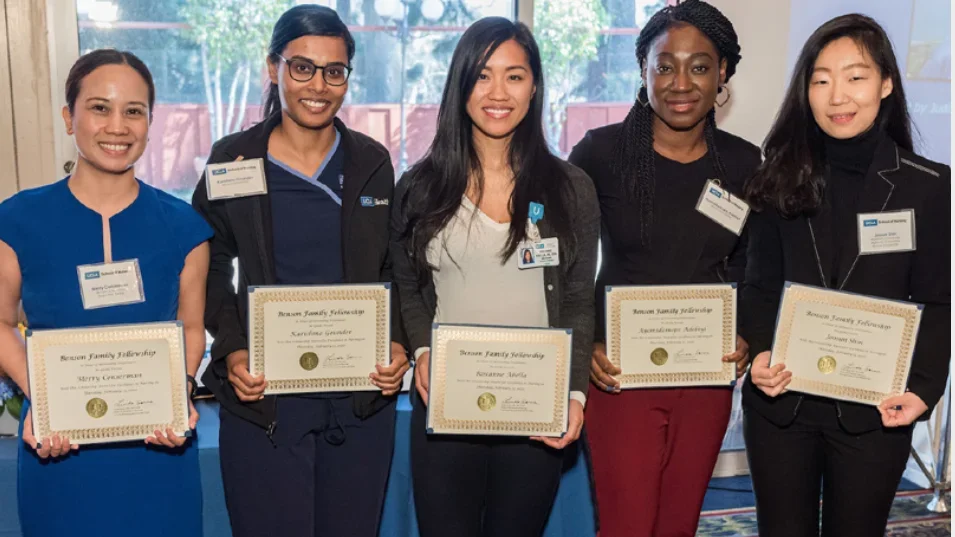 Five SON students at an event holding certificates