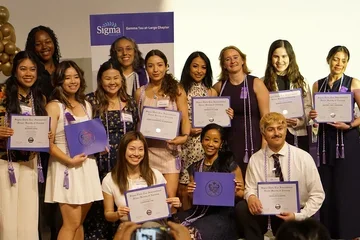 Inductees at the 2025 Sigma Induction Ceremony