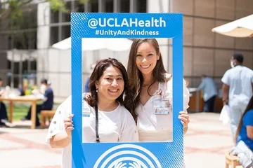2 UCLA Health employees at a past Unity and Kindness event