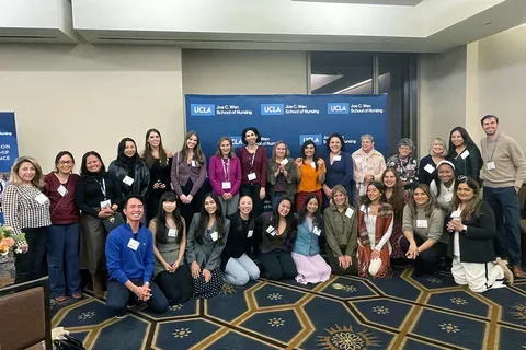 The group of faculty, staff, and alumni at the 2025 UCLA Nursing Doctoral Friendsgiving.