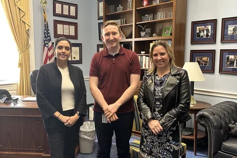 Nursing students with a legislative staffer