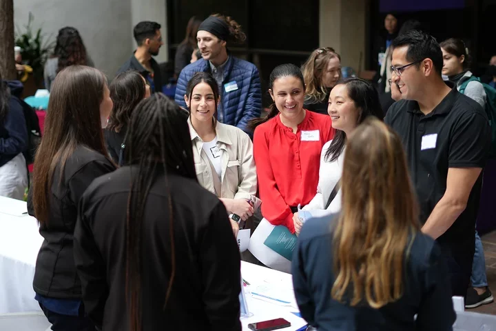 Students speaking with recruiters at the nursing career fair