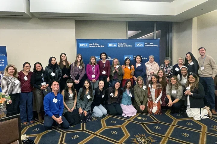 The group of faculty, staff, and alumni at the 2025 UCLA Nursing Doctoral Friendsgiving.