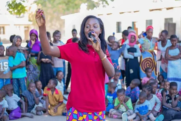 Chilungamo M’manga speaking to young girls in Malawi