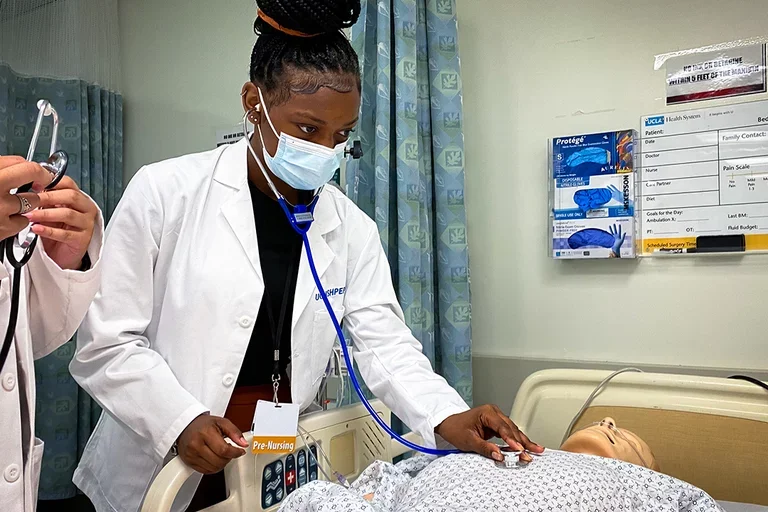 SHPEP students working with a simulation mannequin