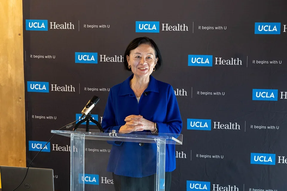 Dean Zhan speaking at the Rosenfeld Hall opening