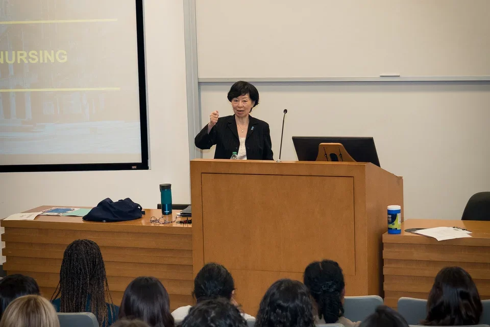 Dean Zhan welcome students at the New Student Welcome