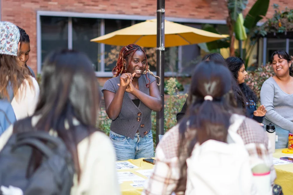 A nursing student presenting at the Student Org fair