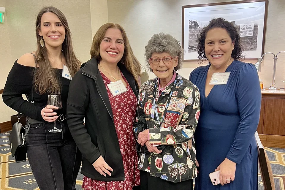 Nursing faculty, students, and alumni at the 2025 Doctoral Friendsgiving