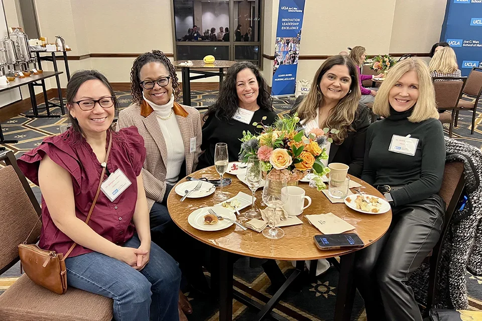 Nursing faculty, students, and alumni at the 2025 Doctoral Friendsgiving