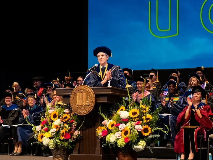 Chancellor Julio Frenk giving the keynote address at the 2025 School of Nursing Commencement Ceremony