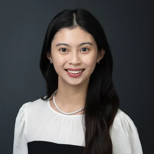 Leanne Bautista in a black and white shirt. 