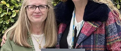 Nancy Pike (left) and Kristi Westphaln (right) posing for a photograph