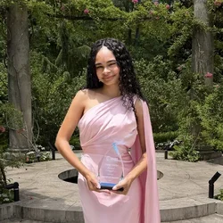 Danielle Paisley holding her NAMI Award for Young Leadership.