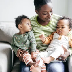 A mother with her 2 young children