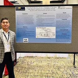 Luigi Estrera with his poster presentation