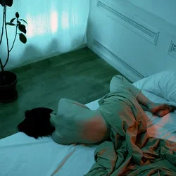 A person lying in bed