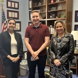 Nursing students with a legislative staffer