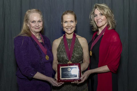 Dr. Kristen Kopelson with UCLA Nursing's Theresa Brown after recieiving her fellowship award from the AANP