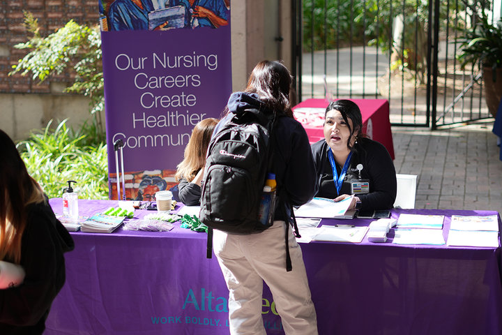 Students speaking with AltaMed at the UCLA Nursing Career Fair